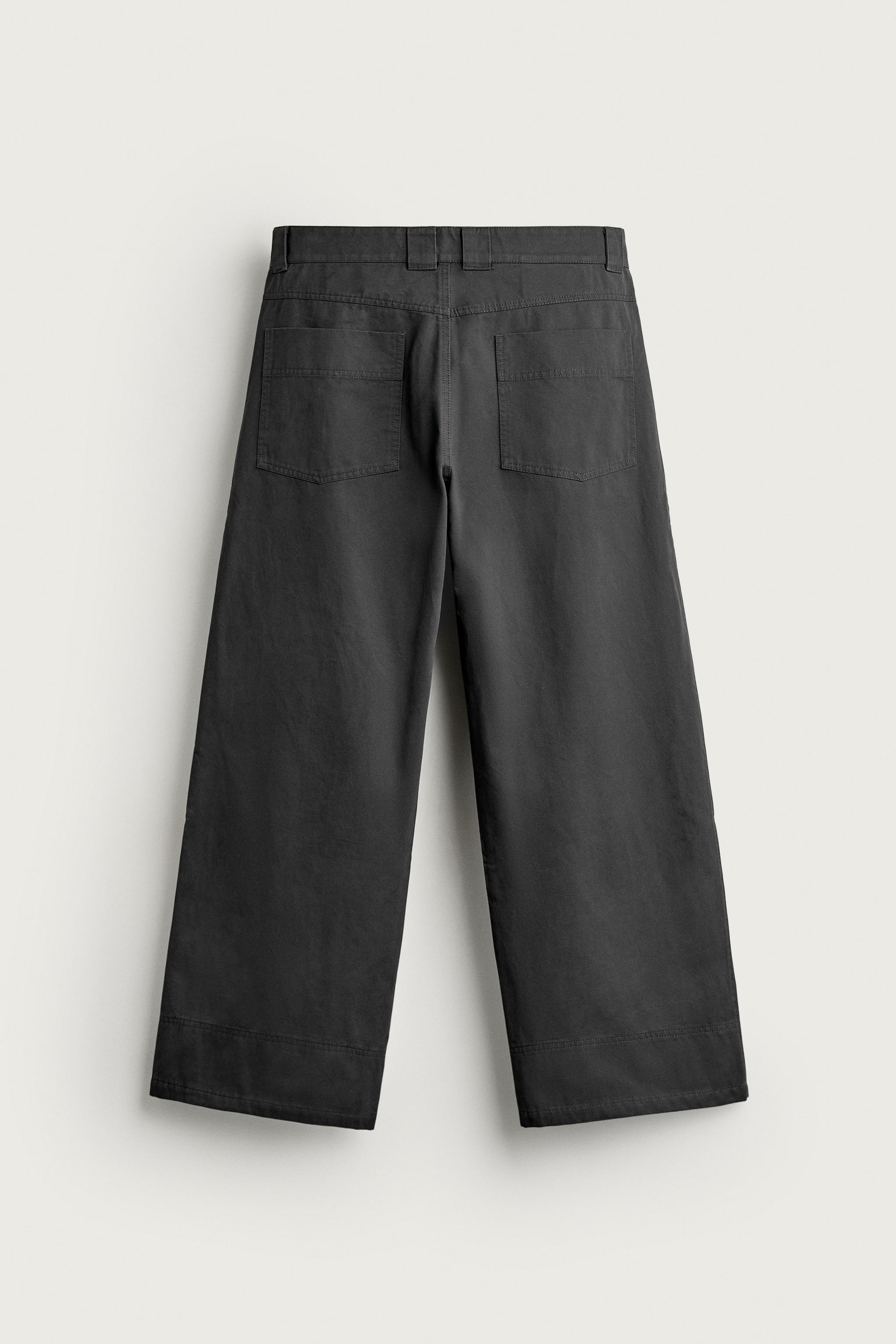 PLEATED WIDE FIT PANTS